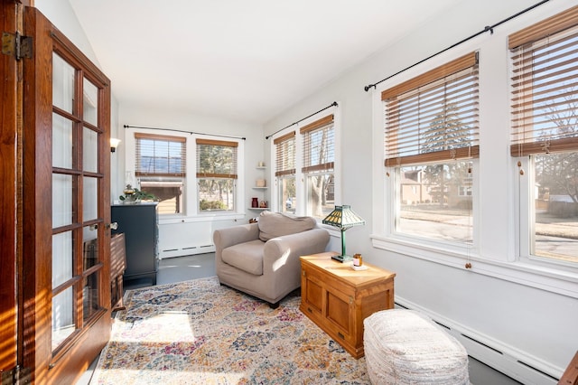 sitting room featuring a baseboard heating unit