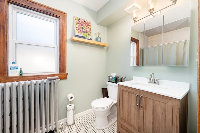 full bathroom featuring vanity, radiator, baseboards, visible vents, and toilet