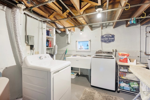 laundry room with independent washer and dryer and laundry area