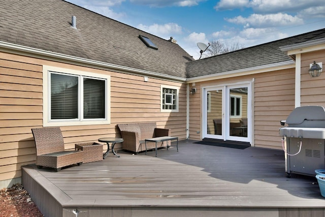 wooden terrace with area for grilling