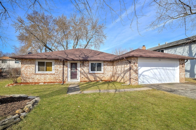 ranch-style home featuring driveway, a front yard, a garage, brick siding, and a chimney