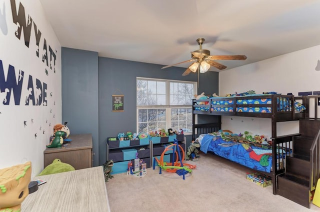 carpeted bedroom featuring a ceiling fan