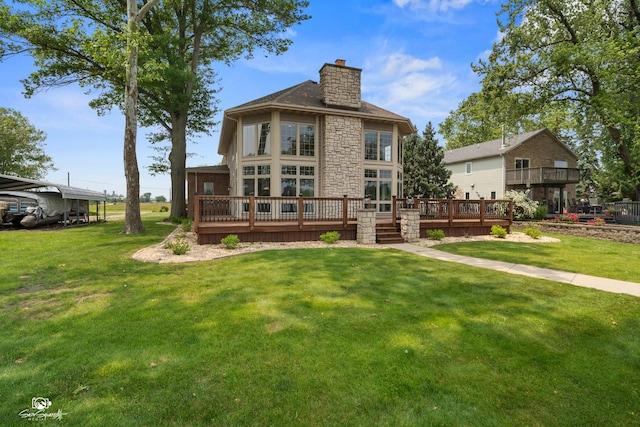 8043 Tamarack Ln, Morris, IL 60450 - back of house featuring stone siding, a chimney, a deck, and a yard