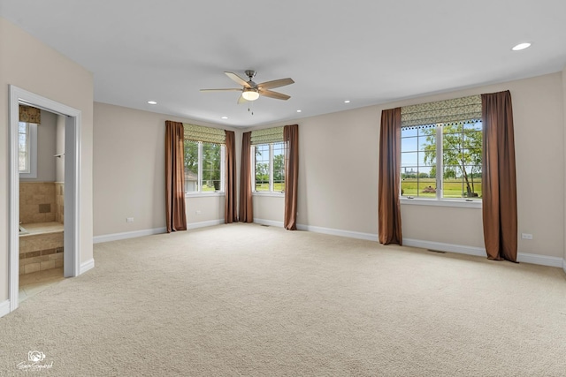 8043 Tamarack Ln, Morris, IL 60450 - empty room with a ceiling fan, light carpet, and recessed lighting