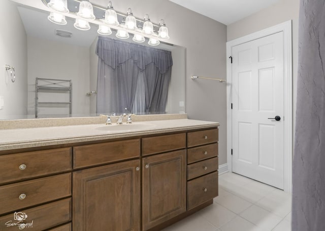 full bathroom featuring tile patterned flooring, vanity, and visible vents