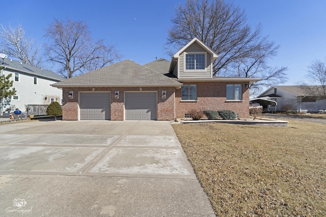 view of front facade with brick siding, roof with shingles, concrete driveway, a garage, and a front lawn