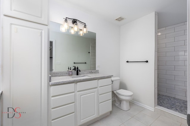 full bath featuring tile patterned flooring, toilet, visible vents, vanity, and a tile shower