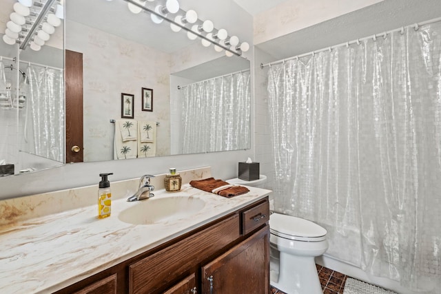 bathroom featuring tile patterned floors, shower / bath combo with shower curtain, toilet, and vanity