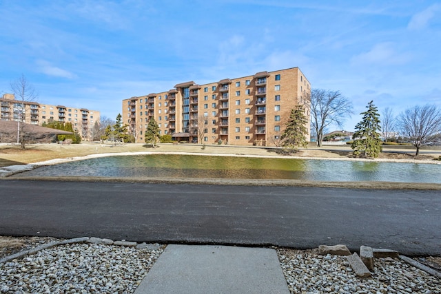 view of property with a water view