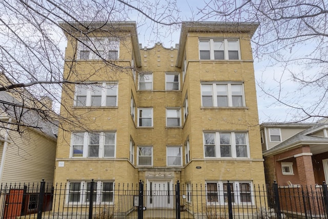 view of property with a fenced front yard