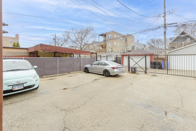 uncovered parking lot with fence