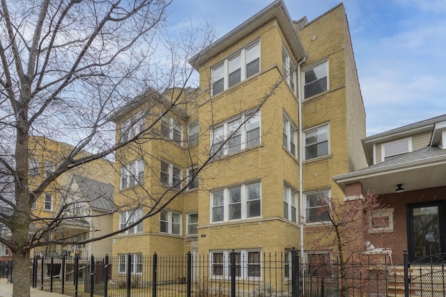 view of property featuring a fenced front yard