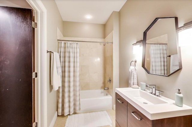 full bathroom with vanity and shower / tub combo