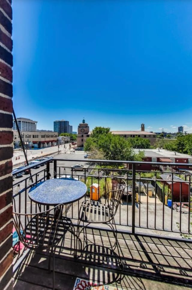 balcony featuring a view of city