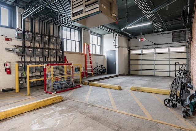 parking deck featuring a garage door opener