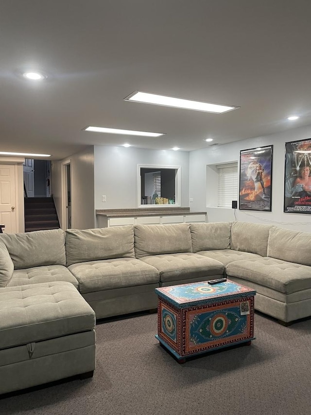 carpeted living area featuring recessed lighting