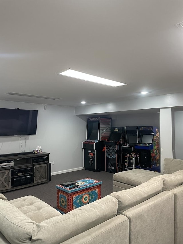 living area featuring baseboards and carpet floors