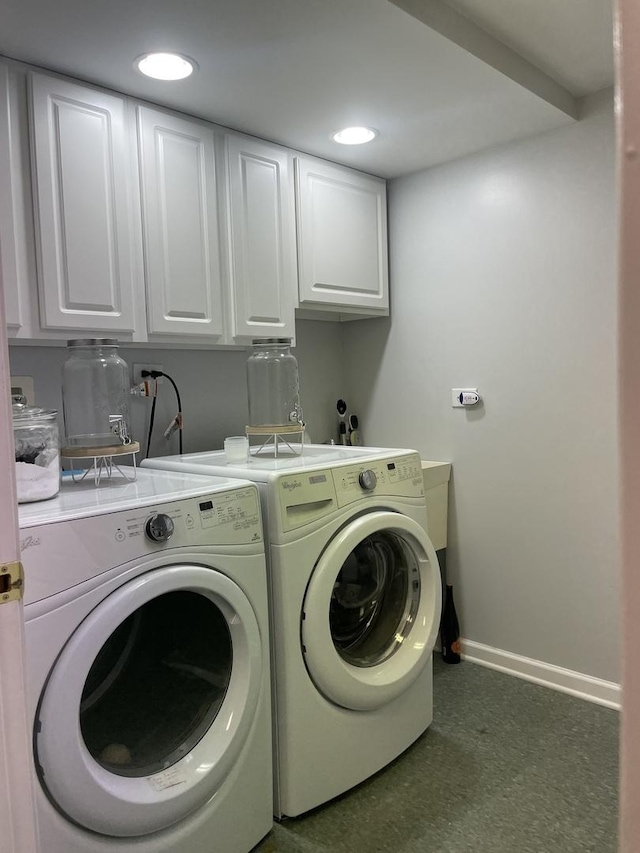 laundry area with washer and dryer, baseboards, cabinet space, and recessed lighting