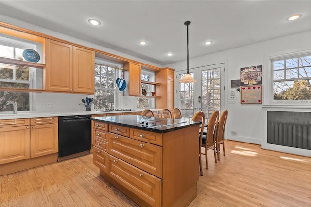 kitchen featuring open shelves, recessed lighting, dishwasher, light wood-type flooring, and a center island