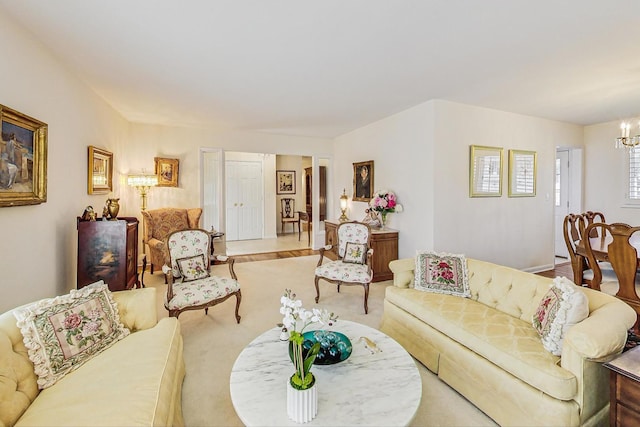 living area featuring a notable chandelier