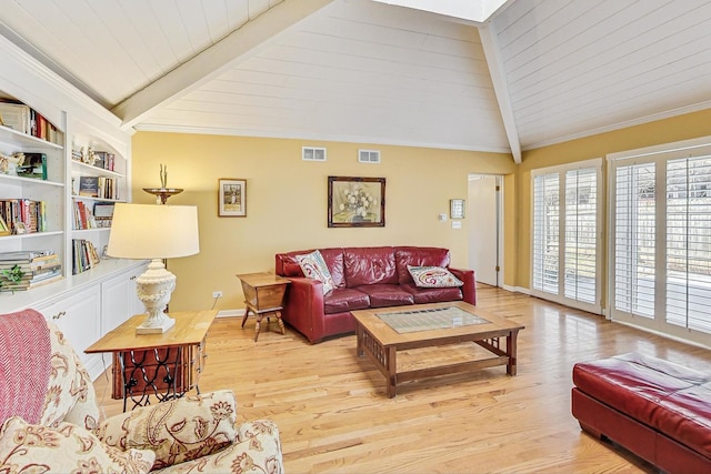 living area featuring crown molding, vaulted ceiling with beams, light wood-style floors, and visible vents