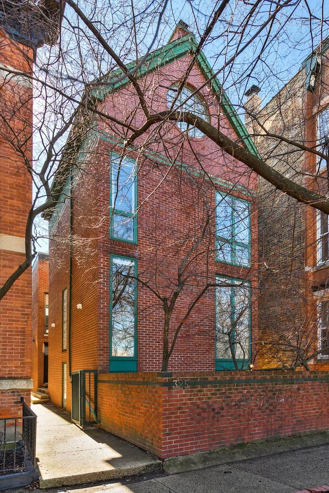 view of home's exterior featuring brick siding