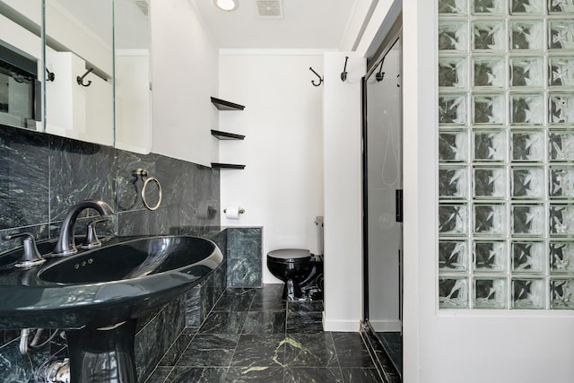 bathroom with visible vents, marble finish floor, decorative backsplash, and a walk in shower