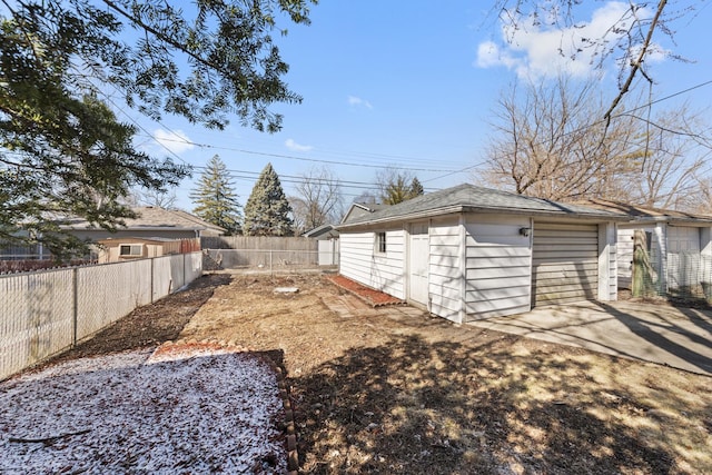 view of yard with a fenced backyard and an outdoor structure