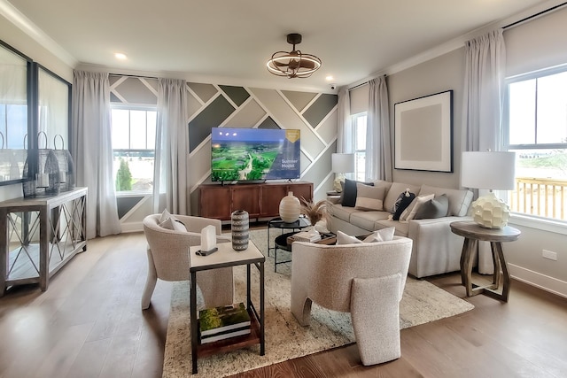 living area featuring plenty of natural light and wood finished floors