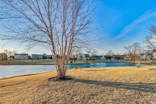 view of yard with a water view