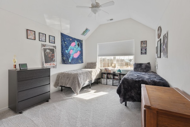 carpeted bedroom with vaulted ceiling, visible vents, and ceiling fan