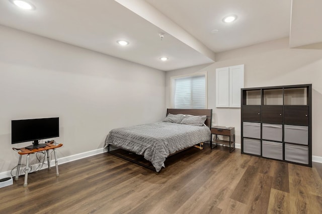 bedroom featuring recessed lighting, baseboards, and wood finished floors