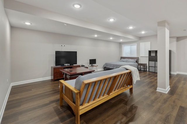 living room featuring recessed lighting, dark wood-type flooring, and baseboards