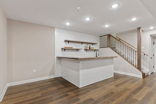 kitchen featuring recessed lighting, baseboards, and dark wood-style flooring