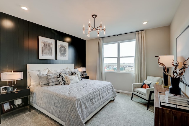 bedroom featuring a notable chandelier, baseboards, carpet flooring, and recessed lighting