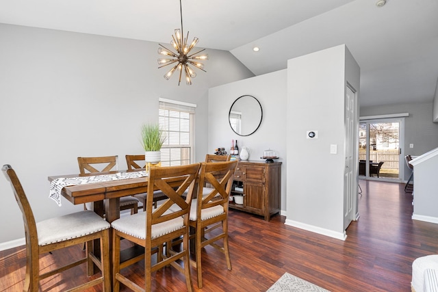 dining space featuring vaulted ceiling, an inviting chandelier, baseboards, and dark wood-style flooring