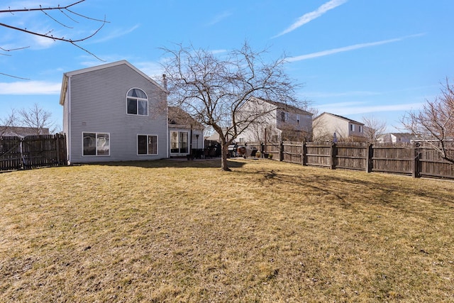 view of yard featuring a fenced backyard