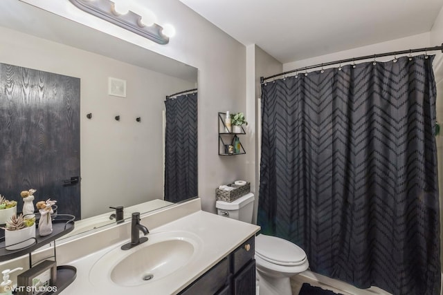 full bath with visible vents, toilet, and vanity