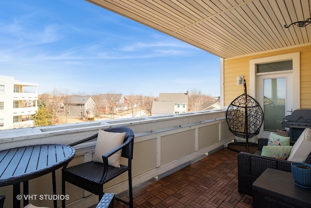 balcony featuring a residential view