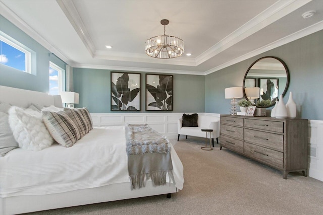 carpeted bedroom featuring a chandelier, recessed lighting, a raised ceiling, and crown molding