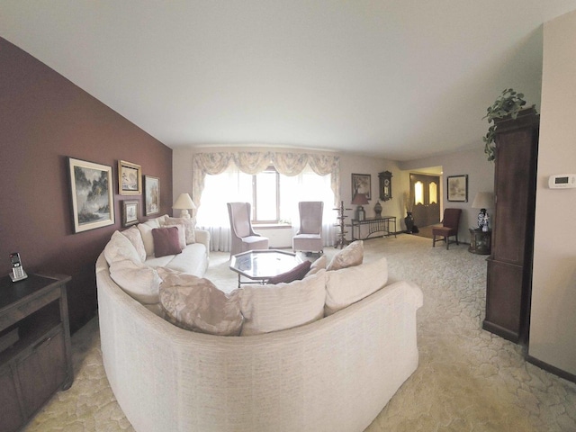 living area featuring light colored carpet