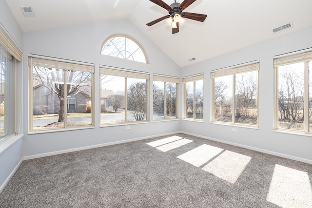 unfurnished sunroom featuring visible vents, ceiling fan, and vaulted ceiling