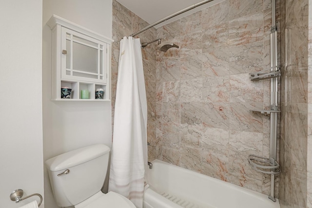 bathroom featuring toilet and shower / bath combination with curtain