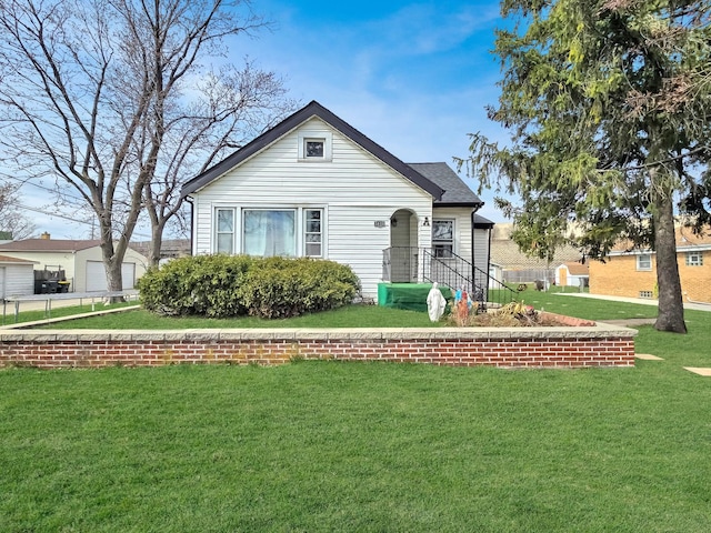 view of front of home with a front lawn