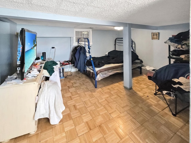 bedroom featuring a textured ceiling