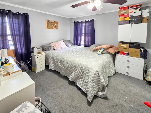 bedroom featuring carpet floors, crown molding, and ceiling fan