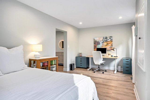 bedroom featuring baseboards, recessed lighting, and light wood-style floors