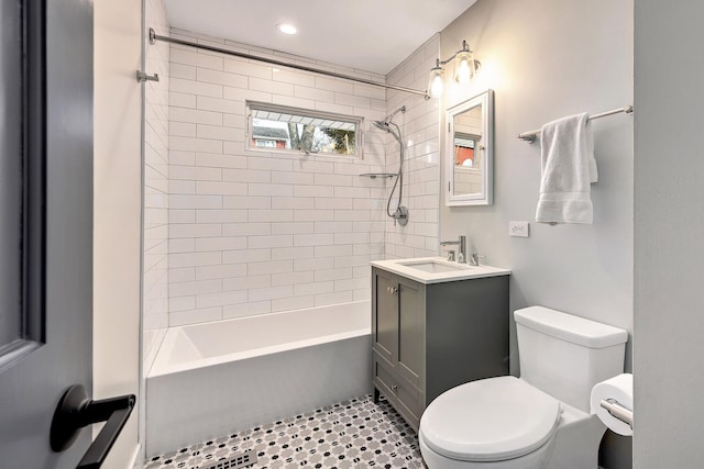 bathroom with shower / bath combination, vanity, toilet, and recessed lighting