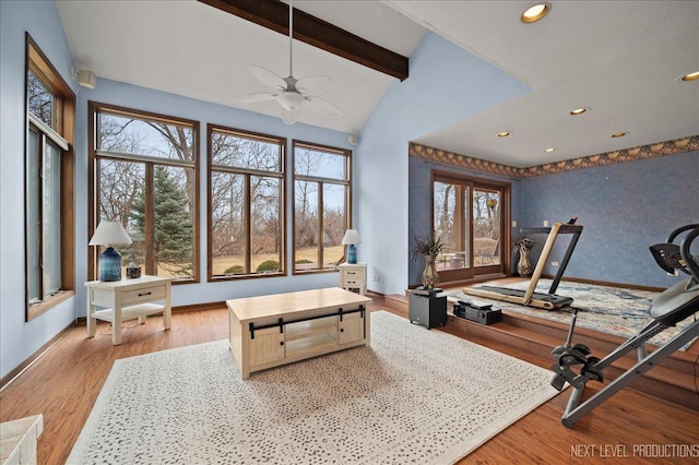 workout area with baseboards, lofted ceiling, recessed lighting, wood finished floors, and a ceiling fan