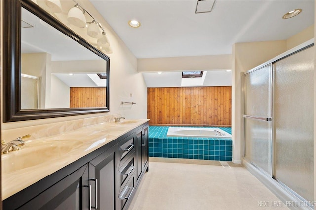 full bathroom with a sink and a shower stall